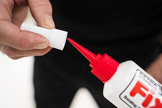 The Original Fix-A-Floor Squeezy All-in-One Repair Adhesive for Loose, Hollow, Creaky Tiles & Wood. Just Drill & Fill! Easy Squeezy! Made in The USA!