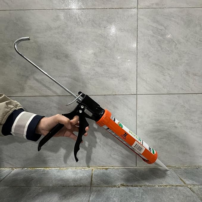 Zeluga 25-210 10 oz. Smooth Hex Rod Cradle Caulking Gun with Spout Cutter, Orange